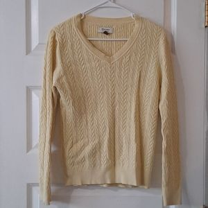 Soft yellow cable knit sweater